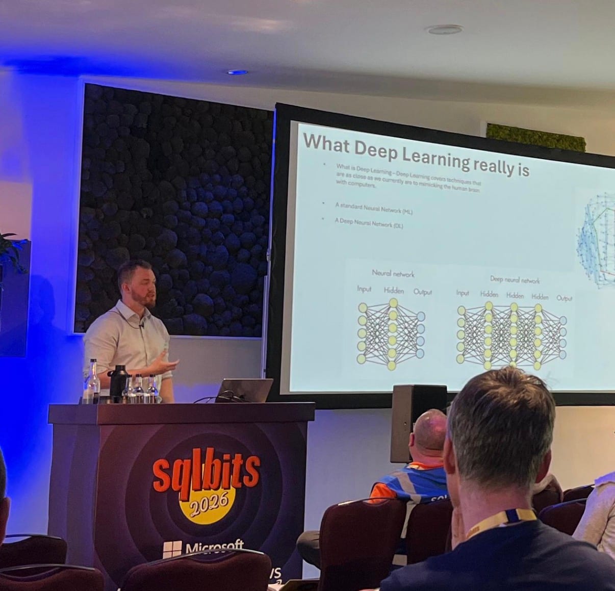 Branden Millward presenting on deep learning at SQLBits 2026